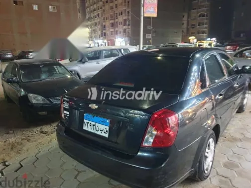 شيفروليه أوبترا 2010 أسود مستعملة للبيع - 3