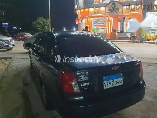 شيفروليه أوبترا 2010 أسود مستعملة للبيع - 4