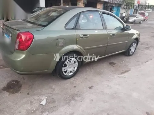 شيفروليه أوبترا 2007 أبيض مستعملة للبيع - 3