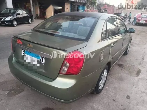 شيفروليه أوبترا 2007 أبيض مستعملة للبيع - 4