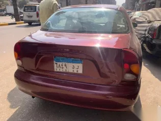 شيفروليه لانوس 2011 أحمر مستعملة للبيع