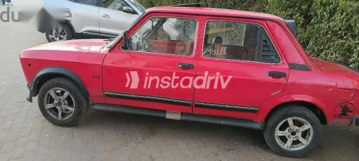 فيات نوفا 1990 أحمر مستعملة للبيع - 1