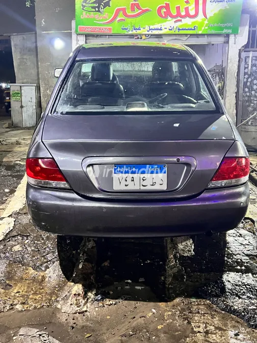 ميتسوبيشي لانسر 2007 أبيض مستعملة للبيع - 1