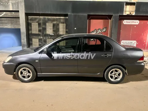 ميتسوبيشي لانسر 2007 أبيض مستعملة للبيع - 2