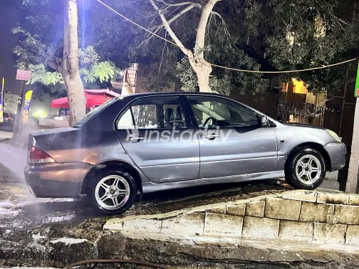 ميتسوبيشي لانسر 2007 أبيض مستعملة للبيع - 3