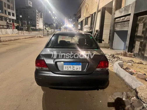 ميتسوبيشي لانسر 2007 أبيض مستعملة للبيع - 4