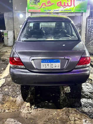 ميتسوبيشي لانسر 2007 أبيض مستعملة للبيع