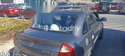 اوبل كورسا 2004 رمادي مستعملة للبيع - 1