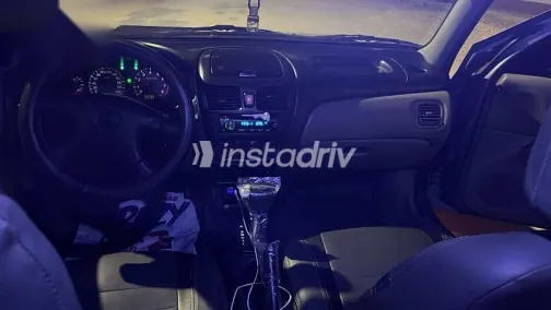 نيسان صنى 2003 رمادي مستعملة للبيع - 3