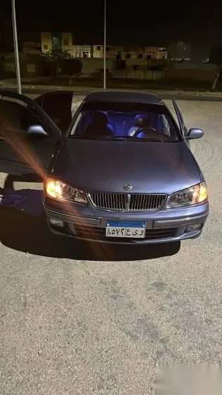 نيسان صنى 2003 رمادي مستعملة للبيع