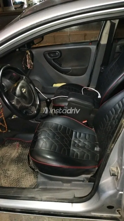 اوبل كورسا 2004 أبيض مستعملة للبيع - 3