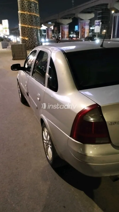 اوبل كورسا 2004 أبيض مستعملة للبيع - 8