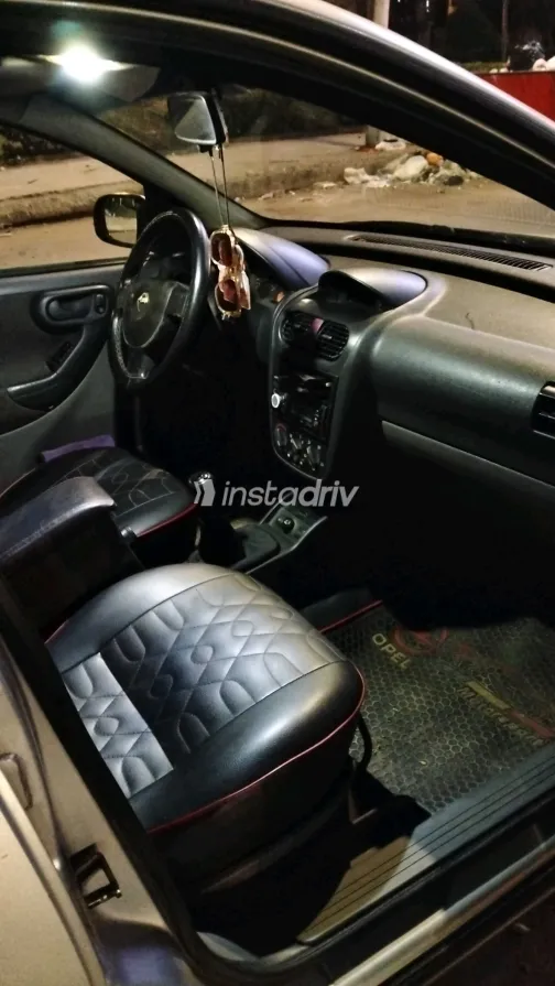 اوبل كورسا 2004 أبيض مستعملة للبيع - 10