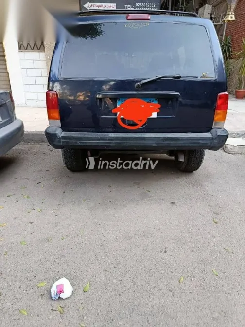 جيب شيروكي 1999 أزرق غامق مستعملة للبيع - 3