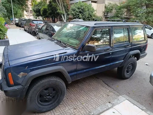 جيب شيروكي 1999 أزرق غامق مستعملة للبيع - 4
