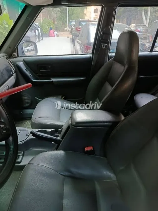 جيب شيروكي 1999 أزرق غامق مستعملة للبيع - 5