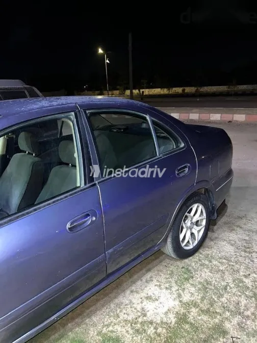 نيسان صنى 2009 رمادي مستعملة للبيع - 1