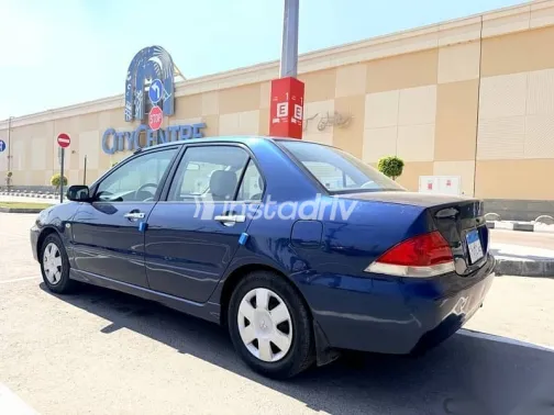 ميتسوبيشي لانسر 2007 أزرق غامق مستعملة للبيع - 5