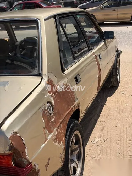 بيجو 305 1979 ذهبي مستعملة للبيع - 1