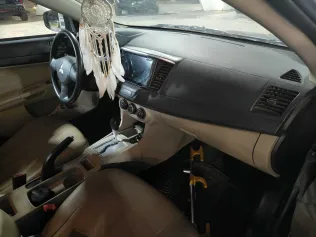 ميتسوبيشي لانسر اى اكس شارك 2016 أبيض مستعملة للبيع