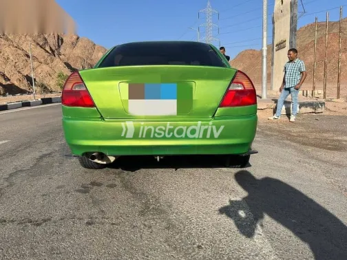 ميتسوبيشي لانسر 1999 أخضر مستعملة للبيع - 3