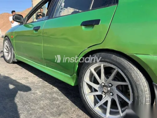 ميتسوبيشي لانسر 1999 أخضر مستعملة للبيع - 6