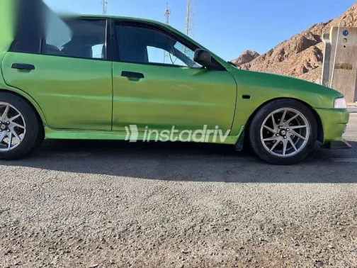 ميتسوبيشي لانسر 1999 أخضر مستعملة للبيع - 7