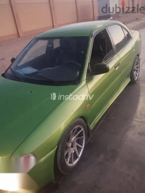 ميتسوبيشي لانسر 1999 أخضر مستعملة للبيع - 10