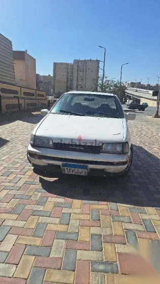 دايهاتسو شاريد 1992 أبيض مستعملة للبيع