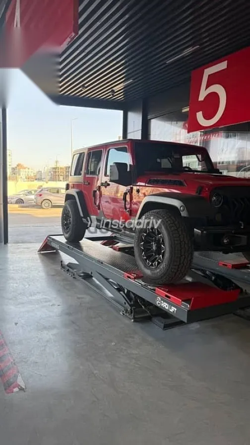 جيب رانجلر 2012 أحمر مستعملة للبيع - 4