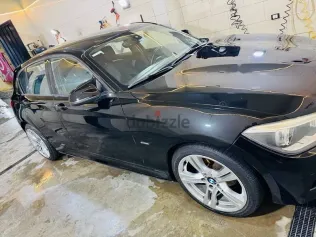 بي ام دبليو 116 2013 أسود مستعملة للبيع