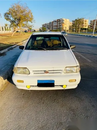 كيا برايد 1999 أبيض مستعملة للبيع