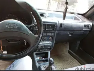 هيونداي اكسيل 1997 أبيض مستعملة للبيع