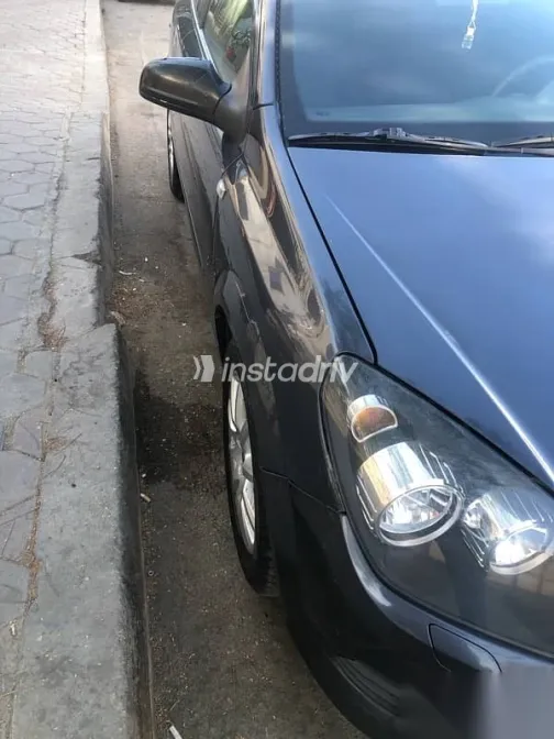 اوبل أسترا 2008 أزرق غامق مستعملة للبيع - 3