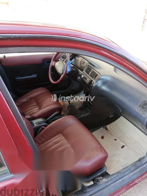 تويوتا كورولا 1995 أحمر مستعملة للبيع - 7