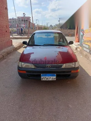 تويوتا كورولا 1995 أحمر مستعملة للبيع