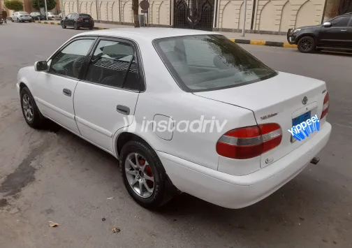 تويوتا كورولا 1999 أبيض مستعملة للبيع - 7