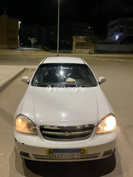 شيفروليه أوبترا 2006 أبيض مستعملة للبيع - 1