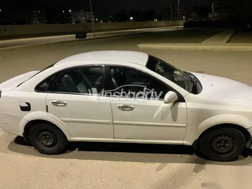 شيفروليه أوبترا 2006 أبيض مستعملة للبيع - 2