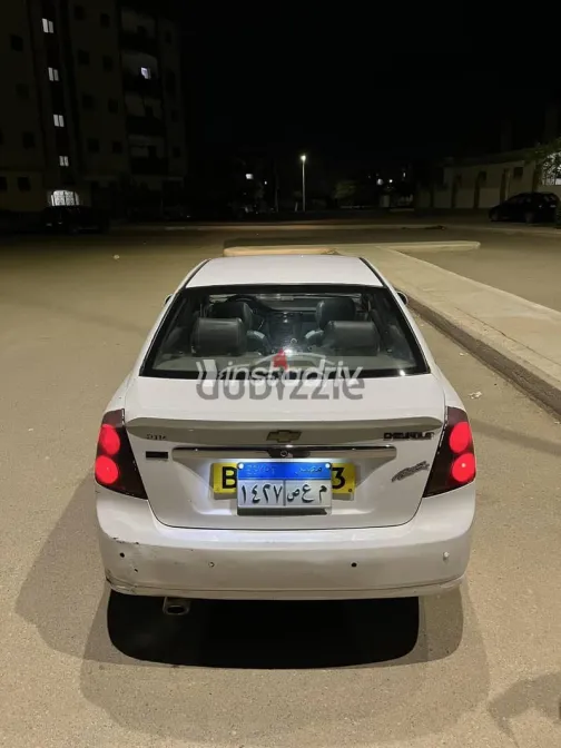 شيفروليه أوبترا 2006 أبيض مستعملة للبيع - 3