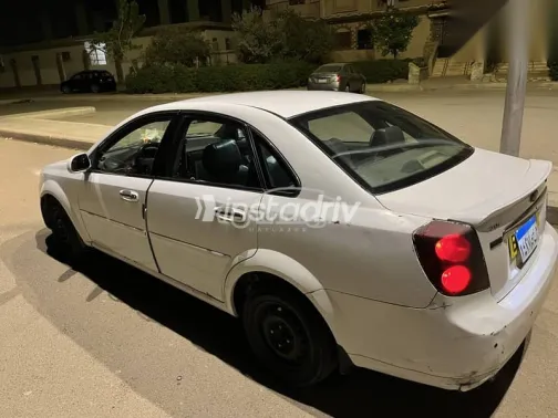 شيفروليه أوبترا 2006 أبيض مستعملة للبيع - 4