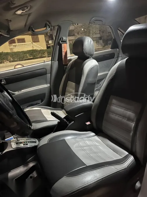 شيفروليه أوبترا 2006 أبيض مستعملة للبيع - 6