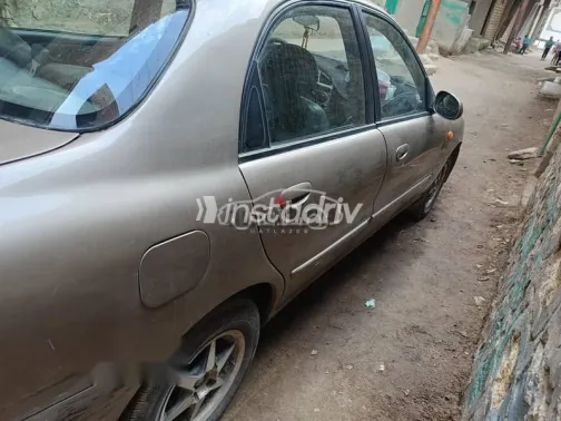 دايو لانوس 2008 ذهبي مستعملة للبيع - 3