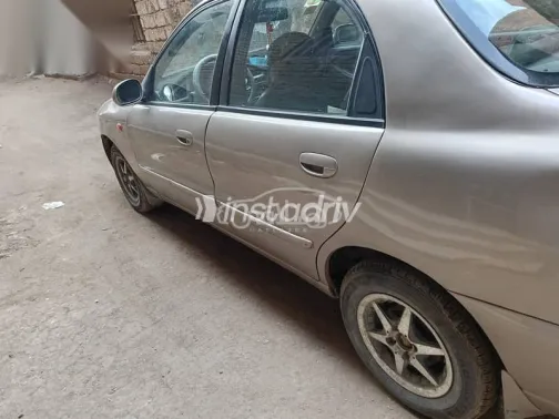 دايو لانوس 2008 ذهبي مستعملة للبيع - 4