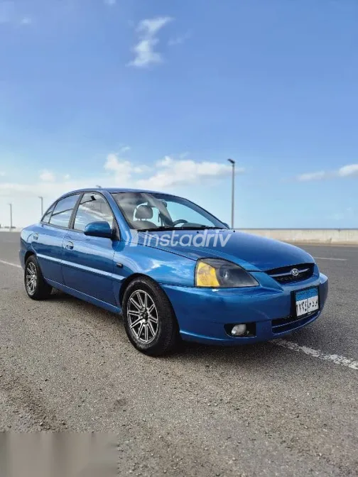 كيا ريو 2005 أزرق غامق مستعملة للبيع - 2