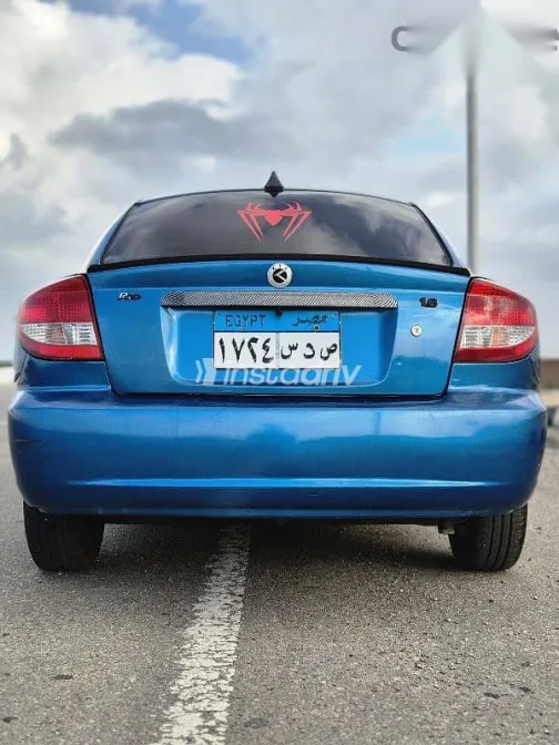 كيا ريو 2005 أزرق غامق مستعملة للبيع - 6