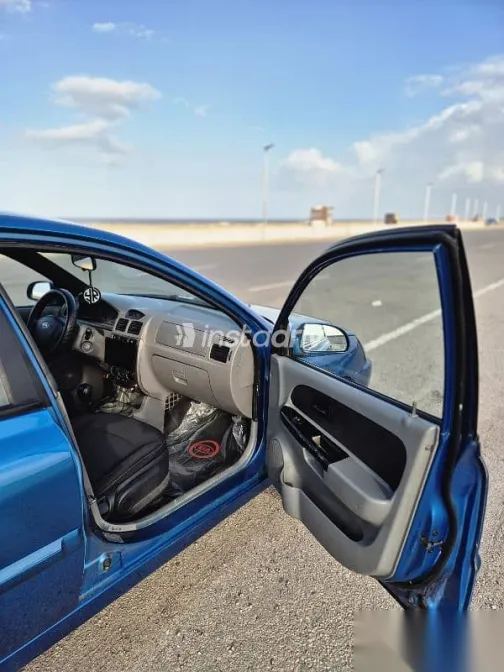 كيا ريو 2005 أزرق غامق مستعملة للبيع - 8