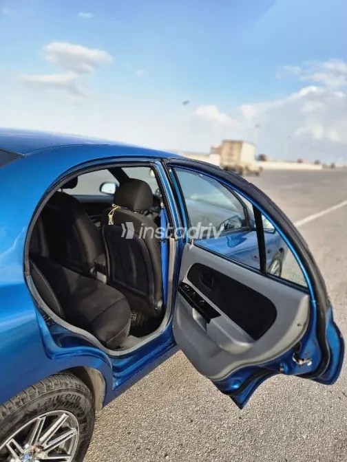 كيا ريو 2005 أزرق غامق مستعملة للبيع - 9