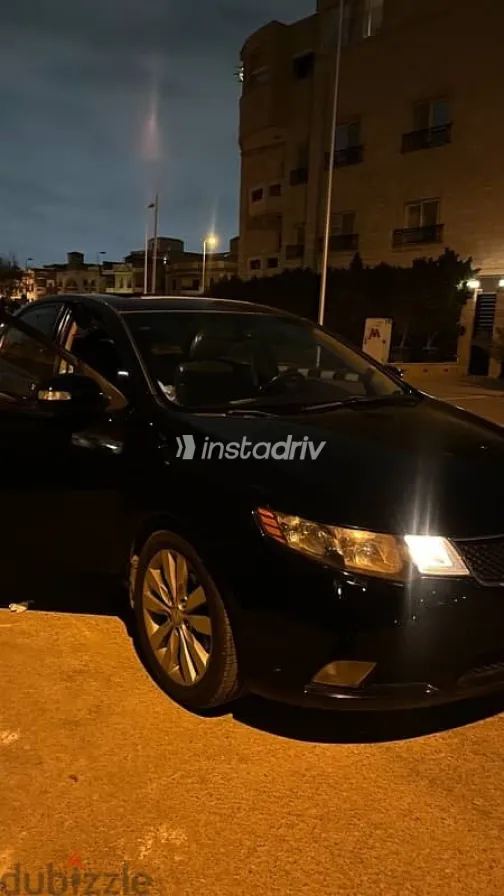 كيا سيراتو 2010 أسود مستعملة للبيع - 2