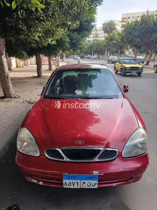 دايو نوبيرا 2005 أحمر مستعملة للبيع - 1